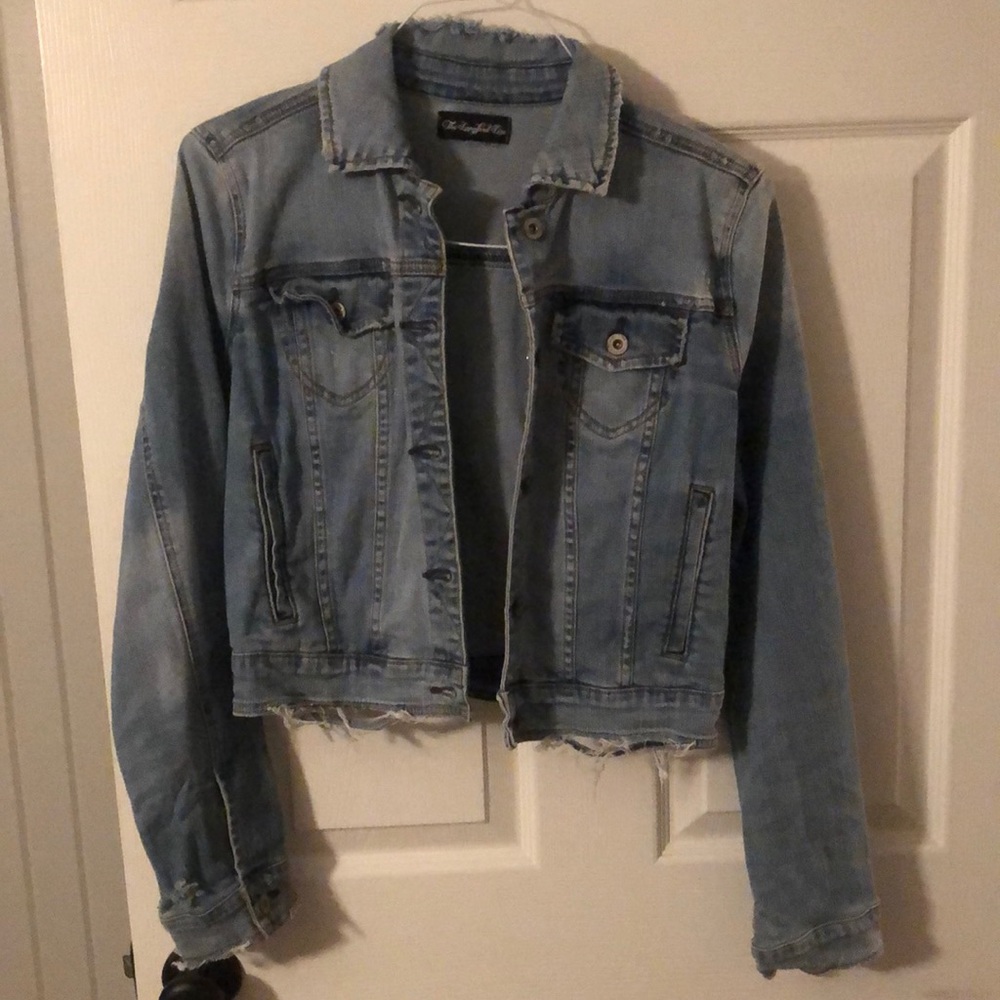 Never worn distressed jean jacket